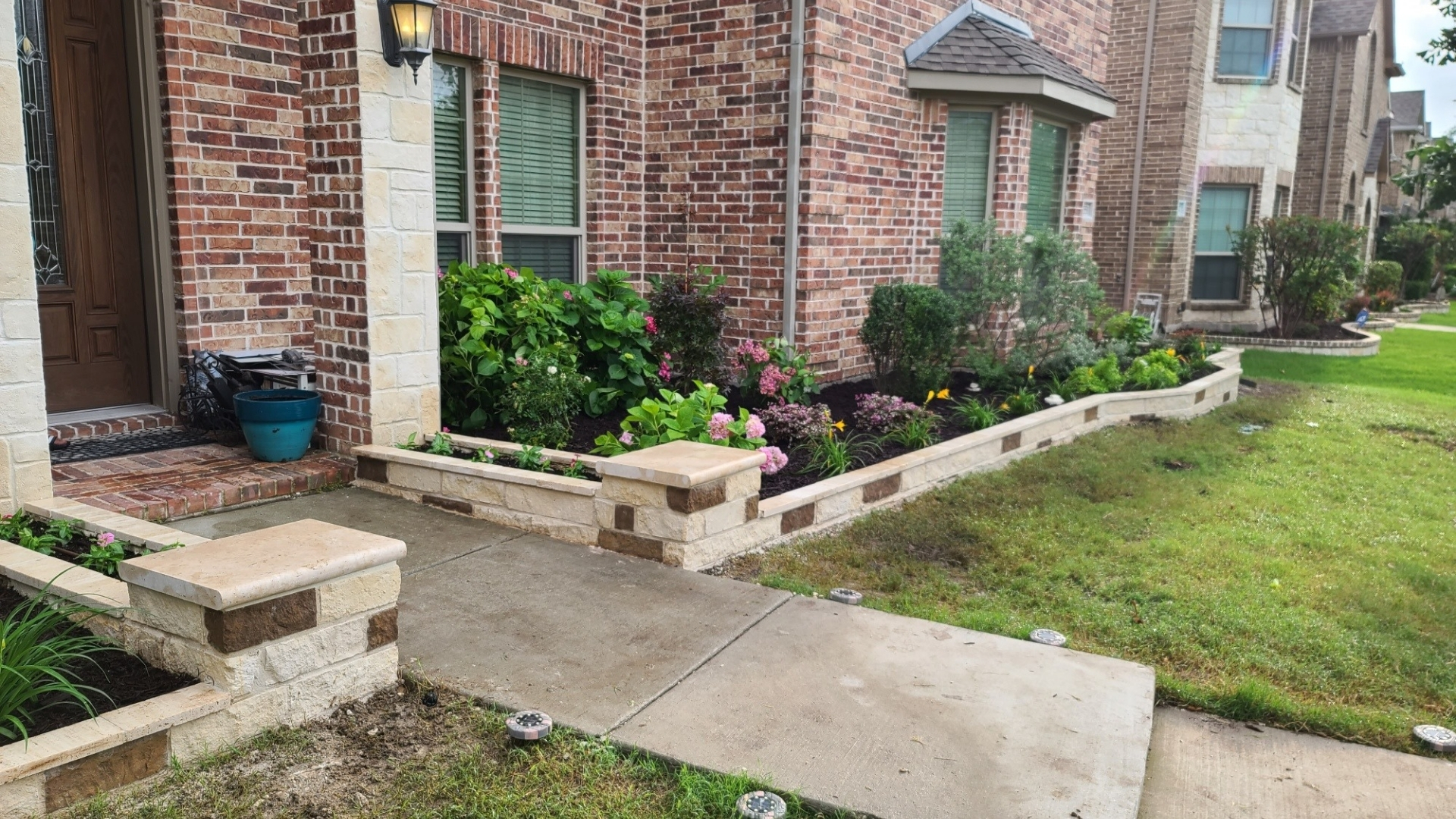 chopped-stone-flower-bed-hydrangeas-front-entry-plano-frisco-tx