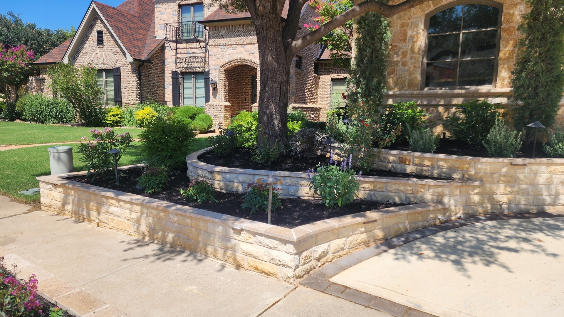 corner-chopped-stone-raised-planters-front-yard-frisco-prosper-tx