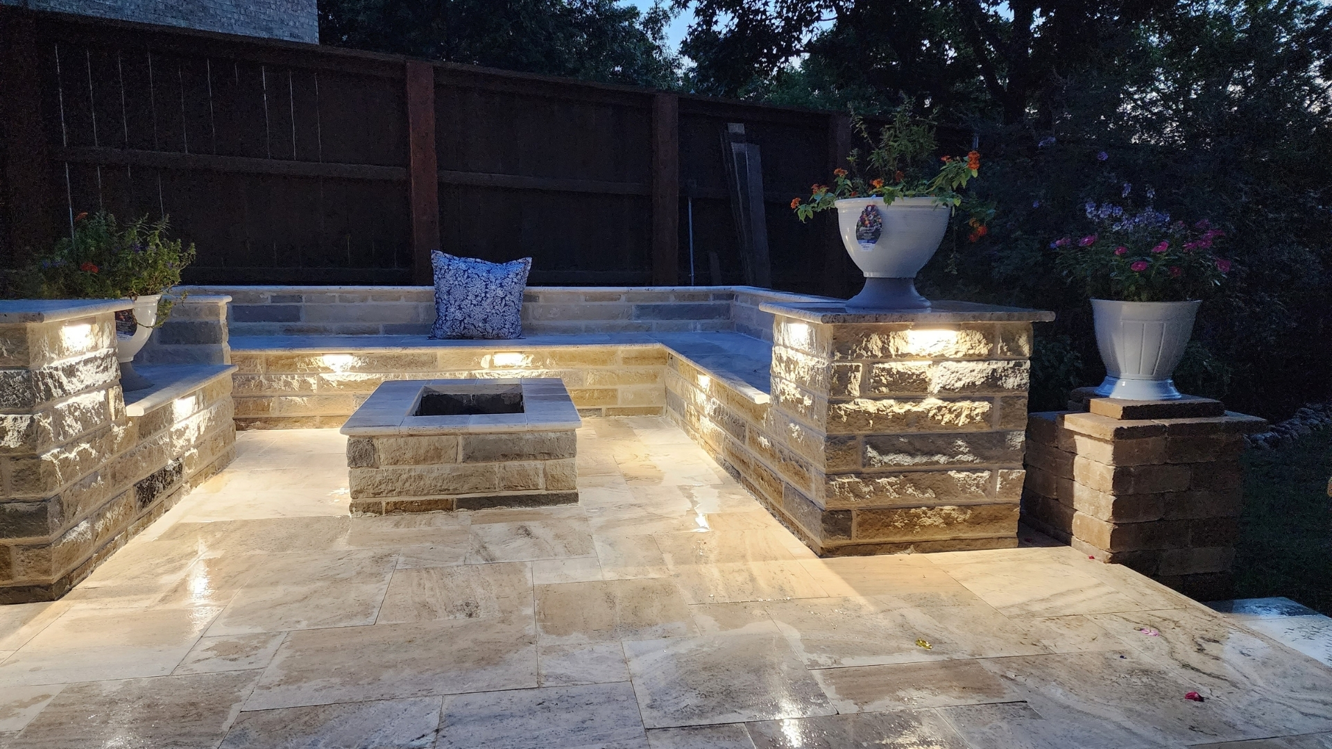 lighted-stone-outdoor-kitchen-seating-night-travertine-frisco-prosper-tx