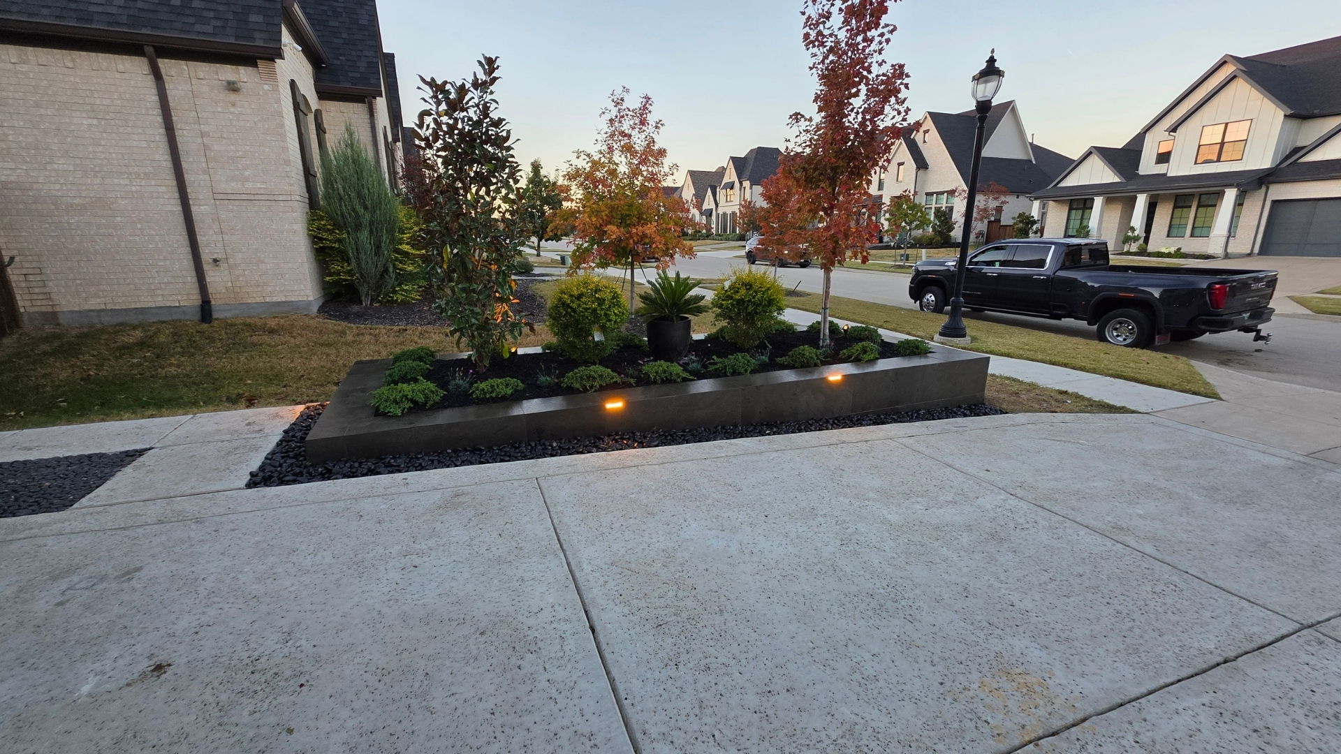 modern-black-stone-corner-planter-led-lights-prosper-frisco-tx